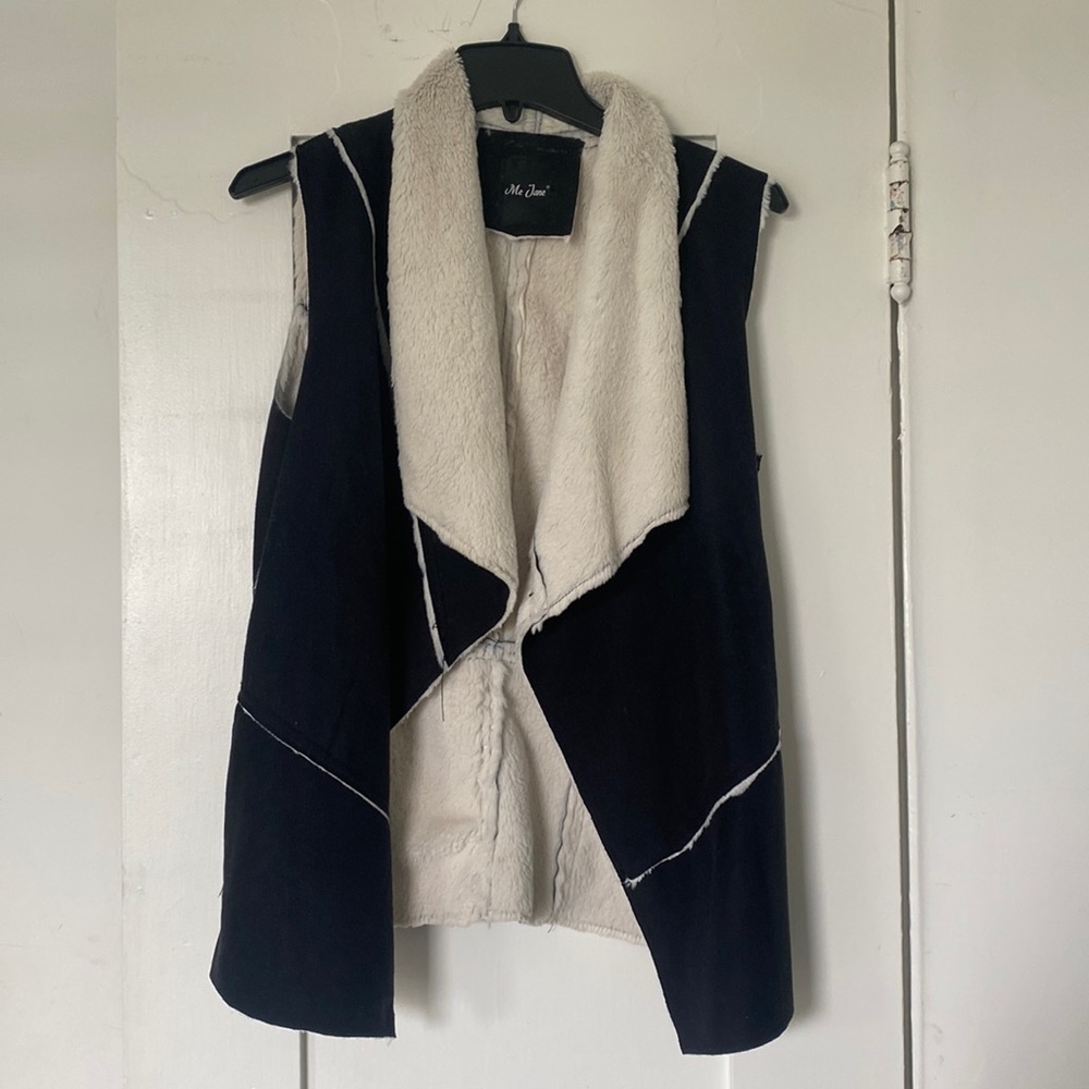 black with white fur vest